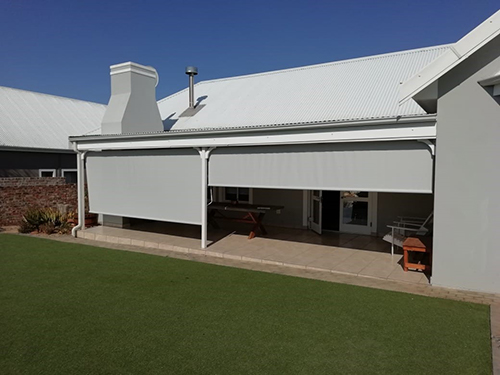 Modern patio with blinds to block wind